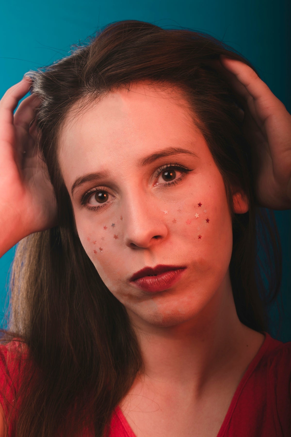 woman in red lipstick and red lipstick